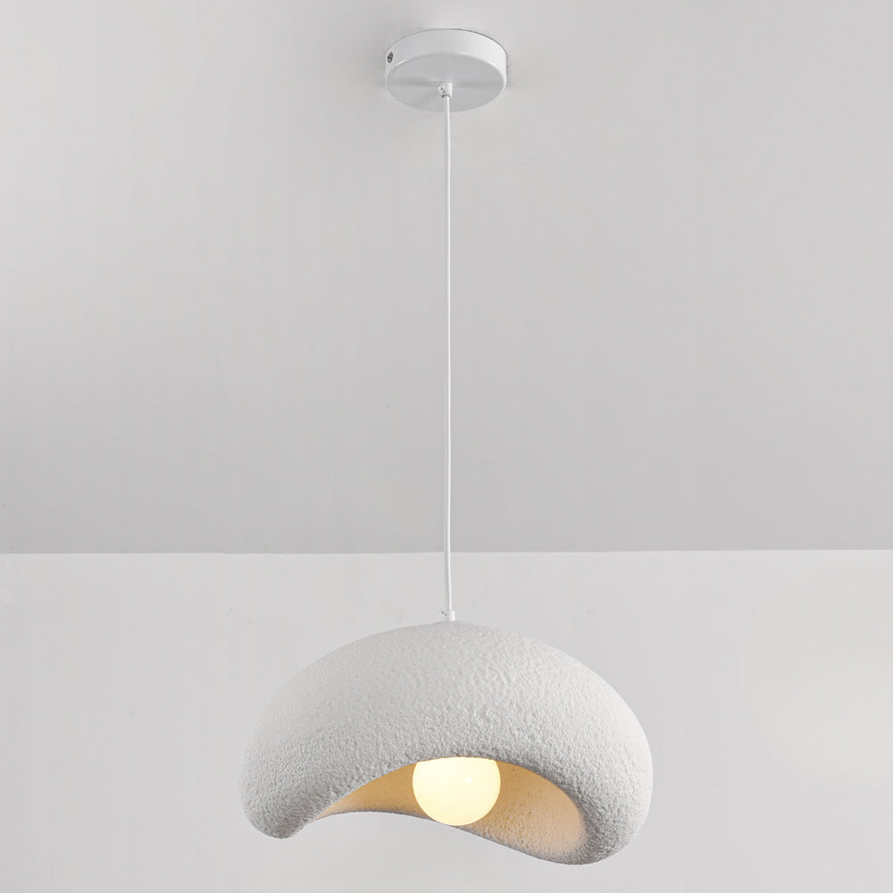 Katsura sculptural white pendant light illuminated showing ambient light through layered design