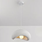 Katsura sculptural white pendant light illuminated showing ambient light through layered design