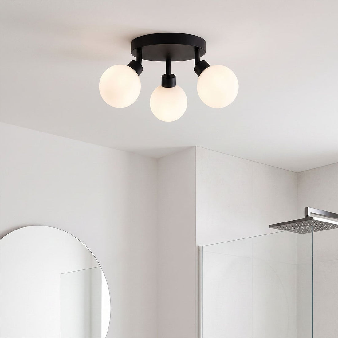 IP44 rated bathroom ceiling light with three opal glass shades