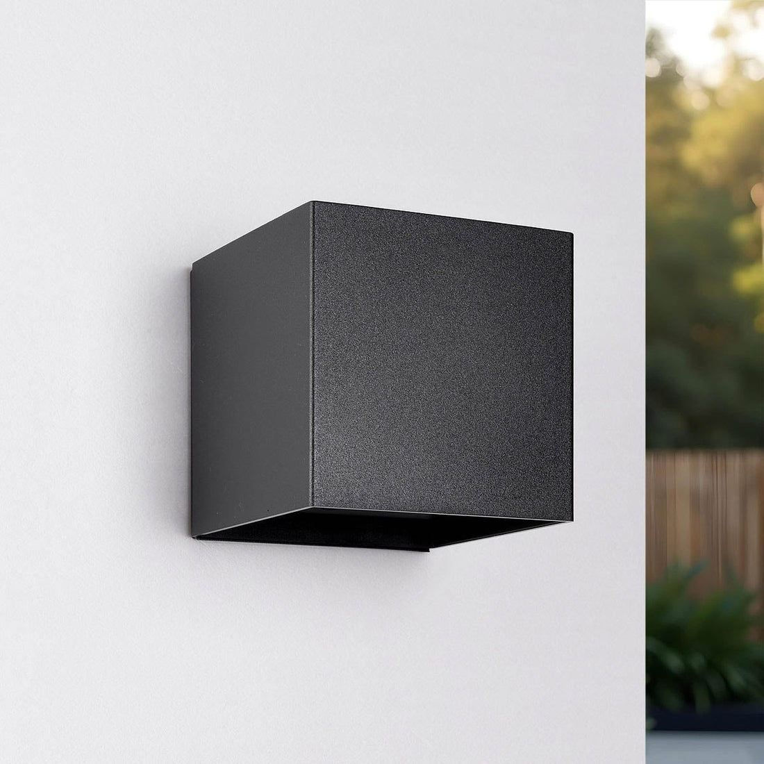 Contemporary black outdoor motion sensor light for garden and doorway installation