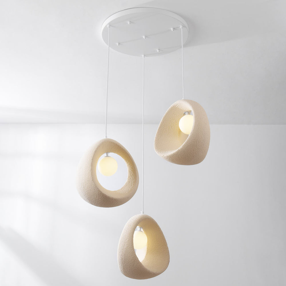 Umi Stone-Effect LED Pendant Light — 3 Lights, Cluster in a room