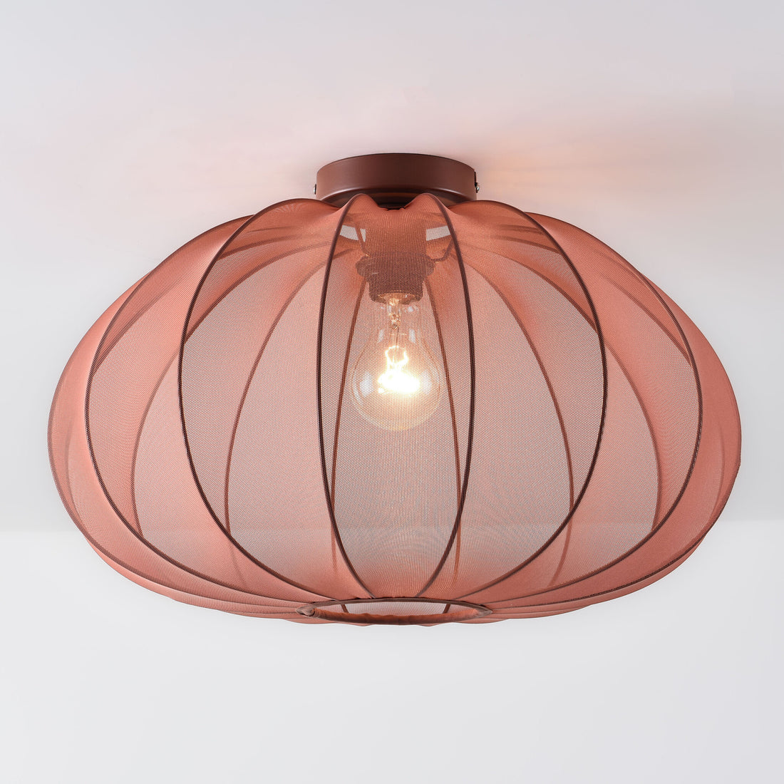 Amaro terracotta pink fabric ceiling light 50cm diameter hanging from white ceiling