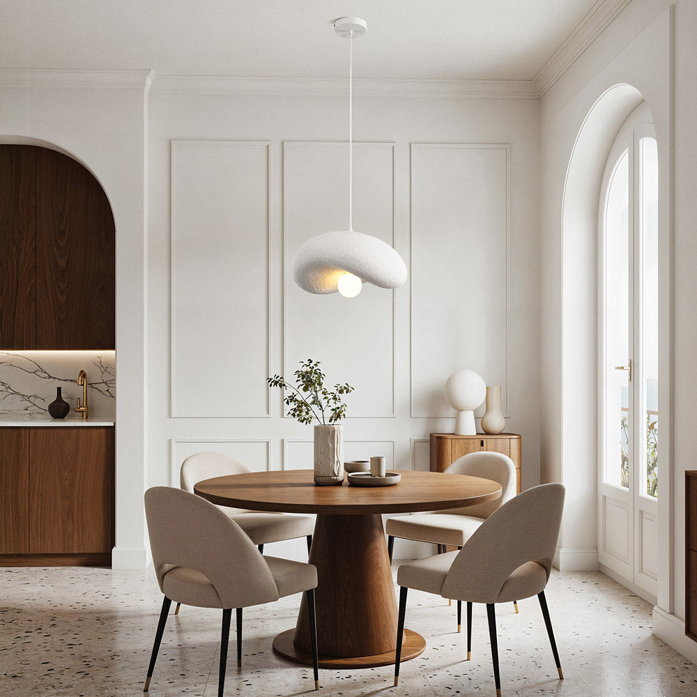 Close-up of Kaia sculptural wave-form pendant shade showing stone texture finish