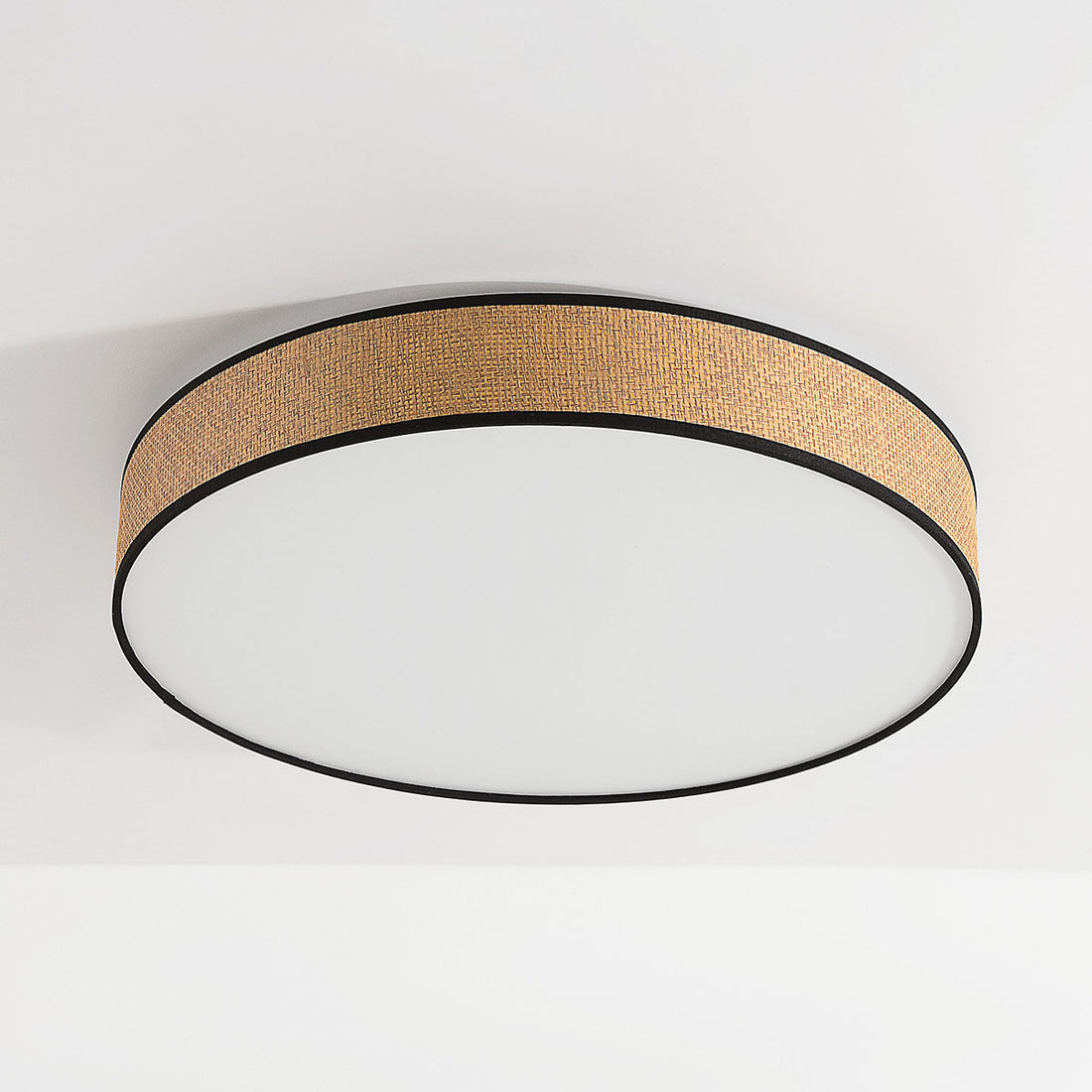 Seto seagrass pendant light illuminated in coastal style living room