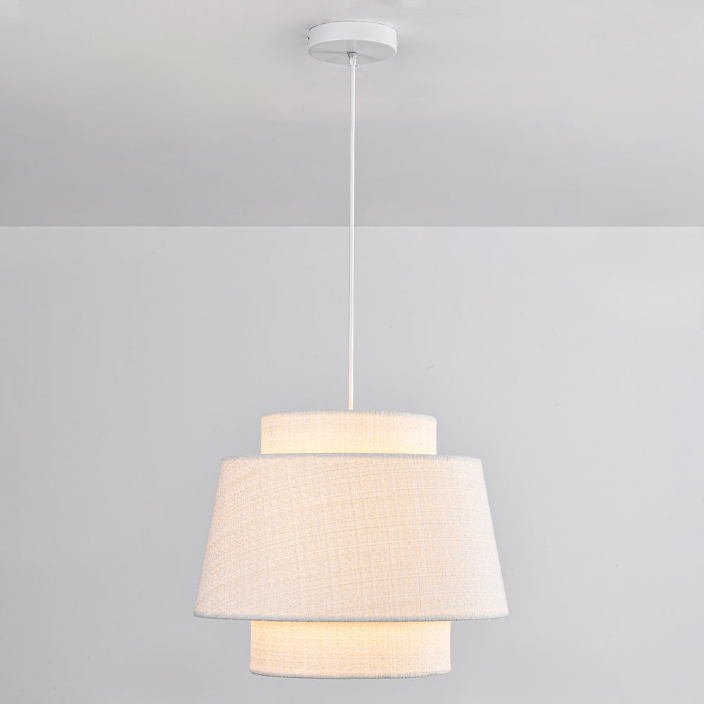 Elin 40cm white drum pendant light suspended above dining table