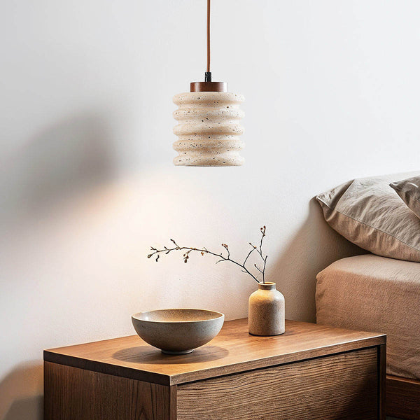 Kyoto beige travertine and wood cylinder pendant light hanging in modern interior