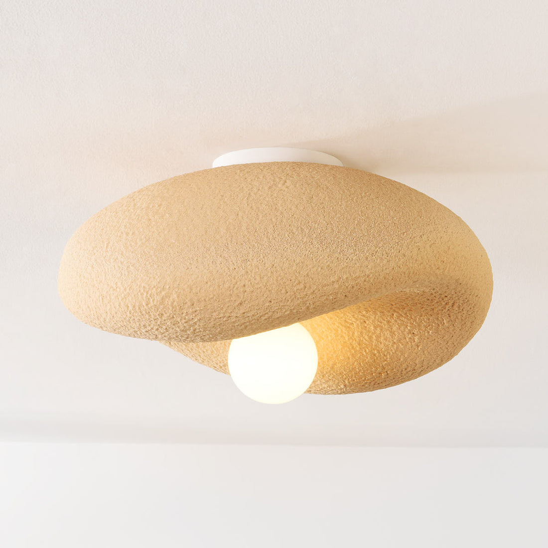 Kaia curved stone-effect ceiling light in light caramel finish, 41cm diameter