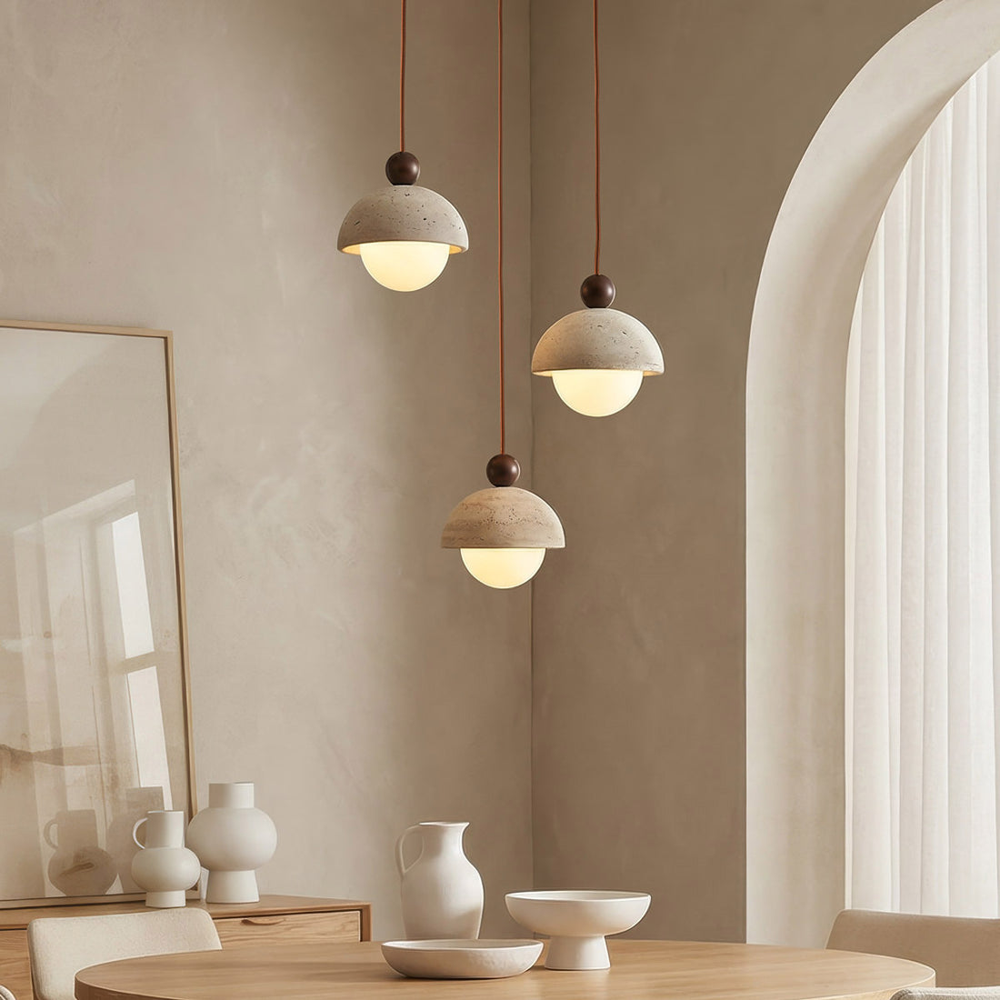 Opale three light travertine pendant lamp with opal glass diffusers hanging from ceiling