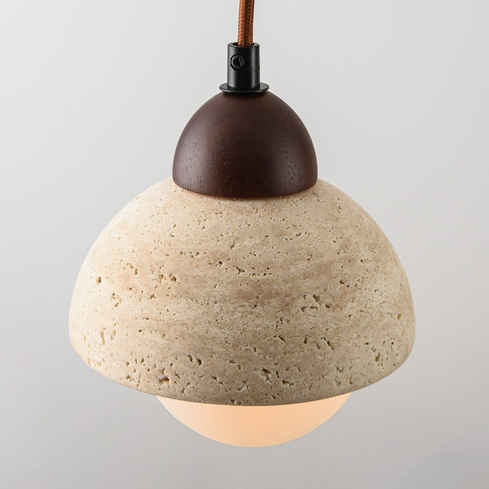 Sabbia Travertine & Glass Pendant Light — 3 Lights, Linear in a room