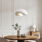 Kaia curved white stone-effect pendant light 40cm diameter hanging from ceiling