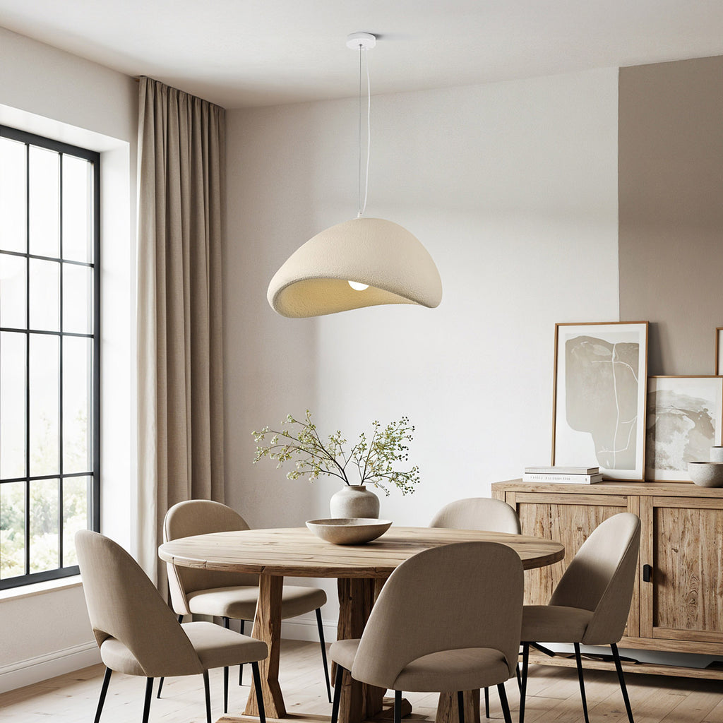 Close-up of organic rippled texture on Kara pendant lamp in sand beige finish