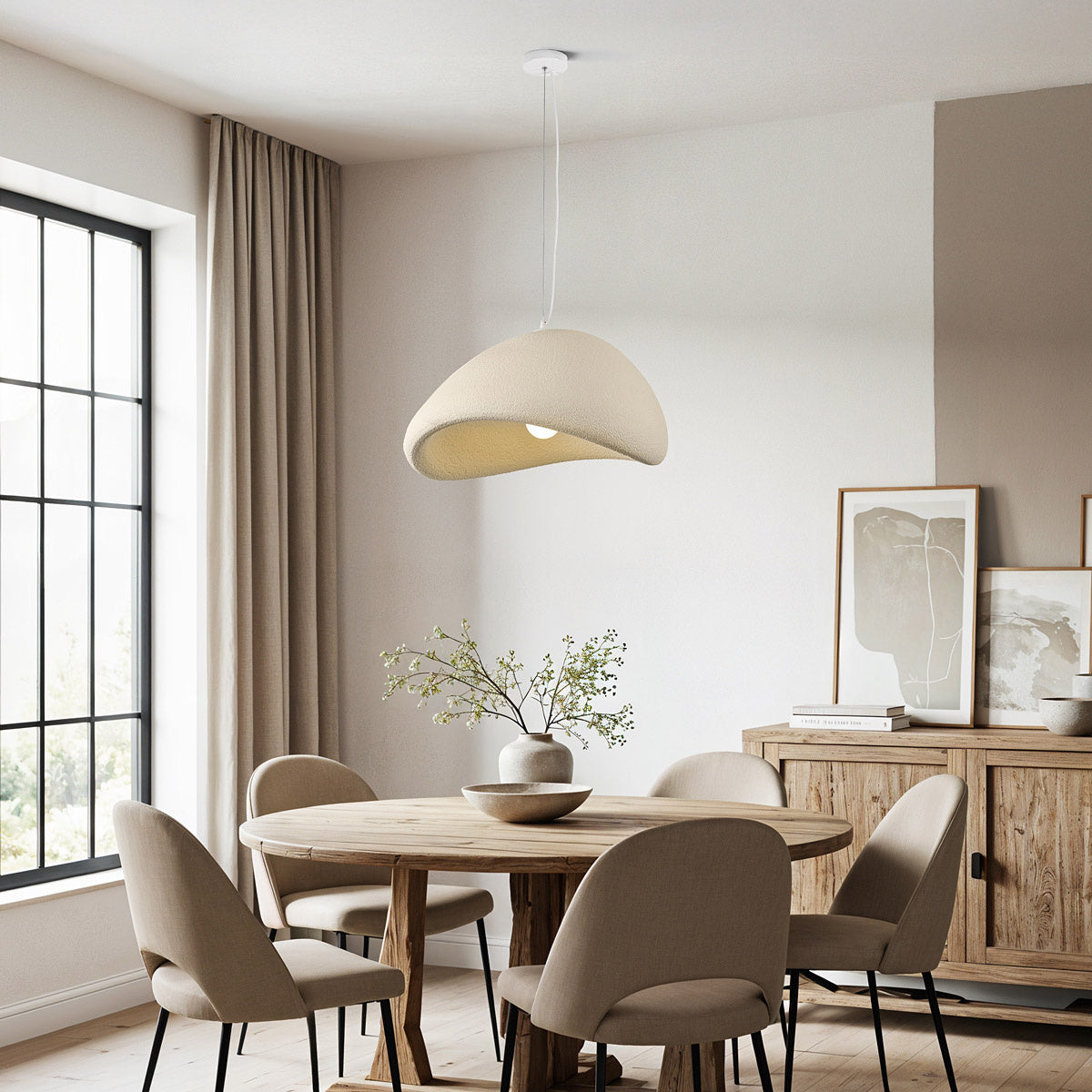 Close-up of organic rippled texture on Kara pendant lamp in sand beige finish