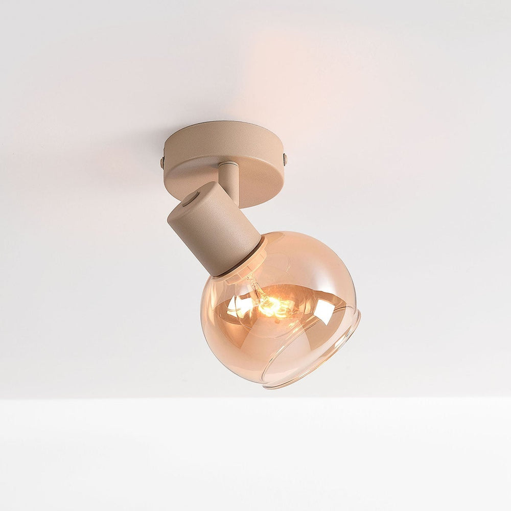 Beno Adjustable Spotlight — Beige & Amber Glass, Single after dark