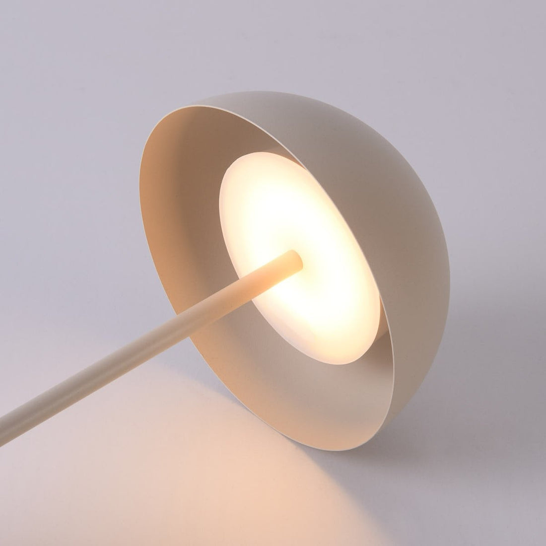 Fungo beige table lamp in modern living room setting