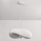 Kaia 60cm white pendant light illuminated in modern living room interior