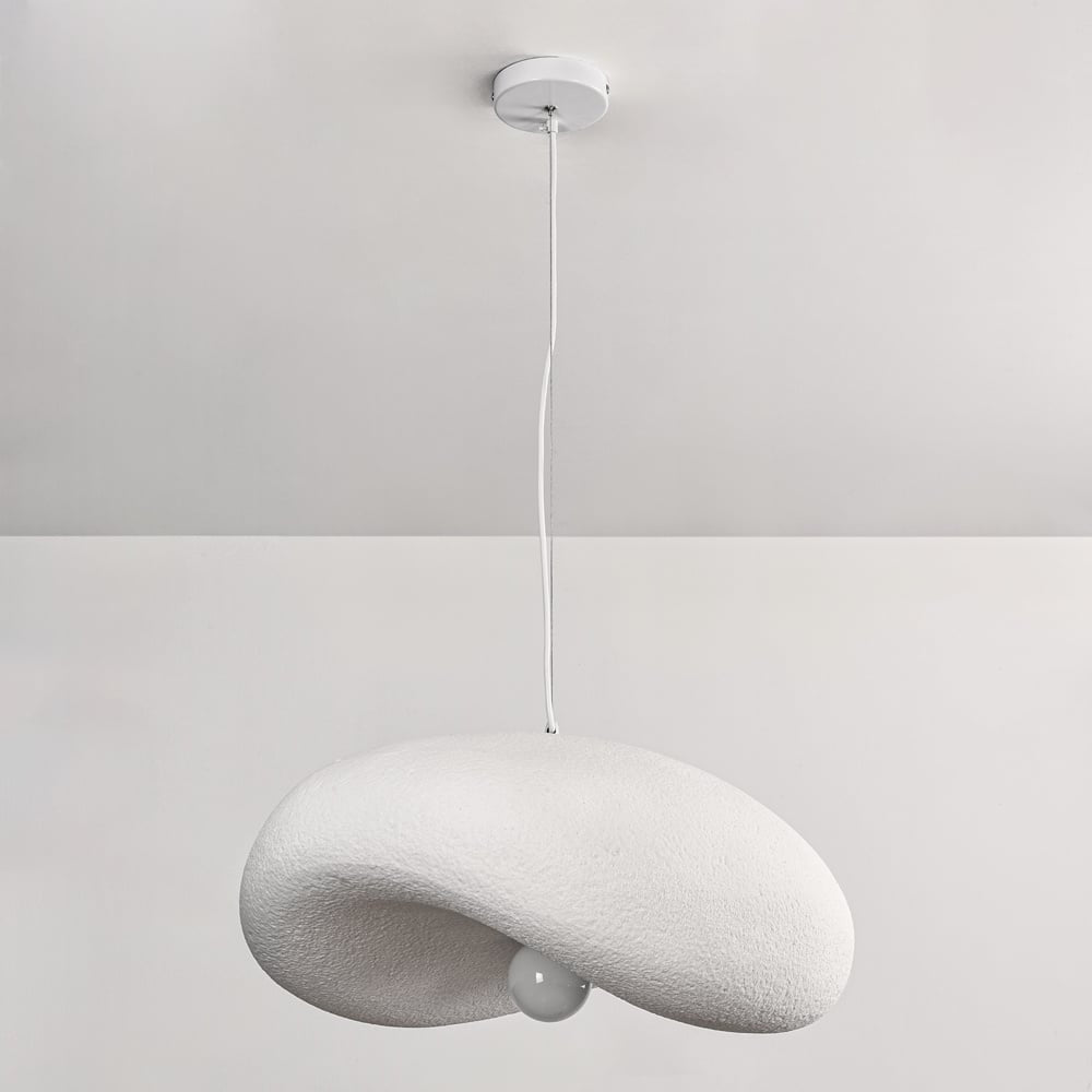 Kaia 60cm white pendant light illuminated in modern living room interior