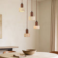 Taoka travertine and wood pendant light with four round shades at different heights