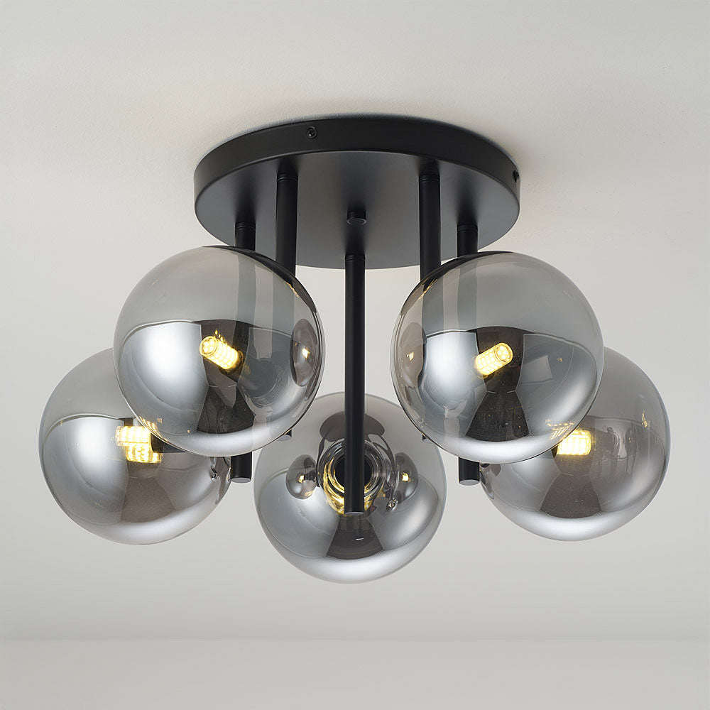 Noir Five-Light Ceiling Light — Black & Smoked Glass in a room