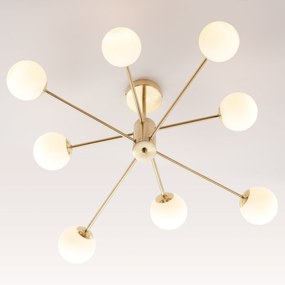 Dorado Eight-Light Ceiling Light — Gold & Frosted Glass in a room