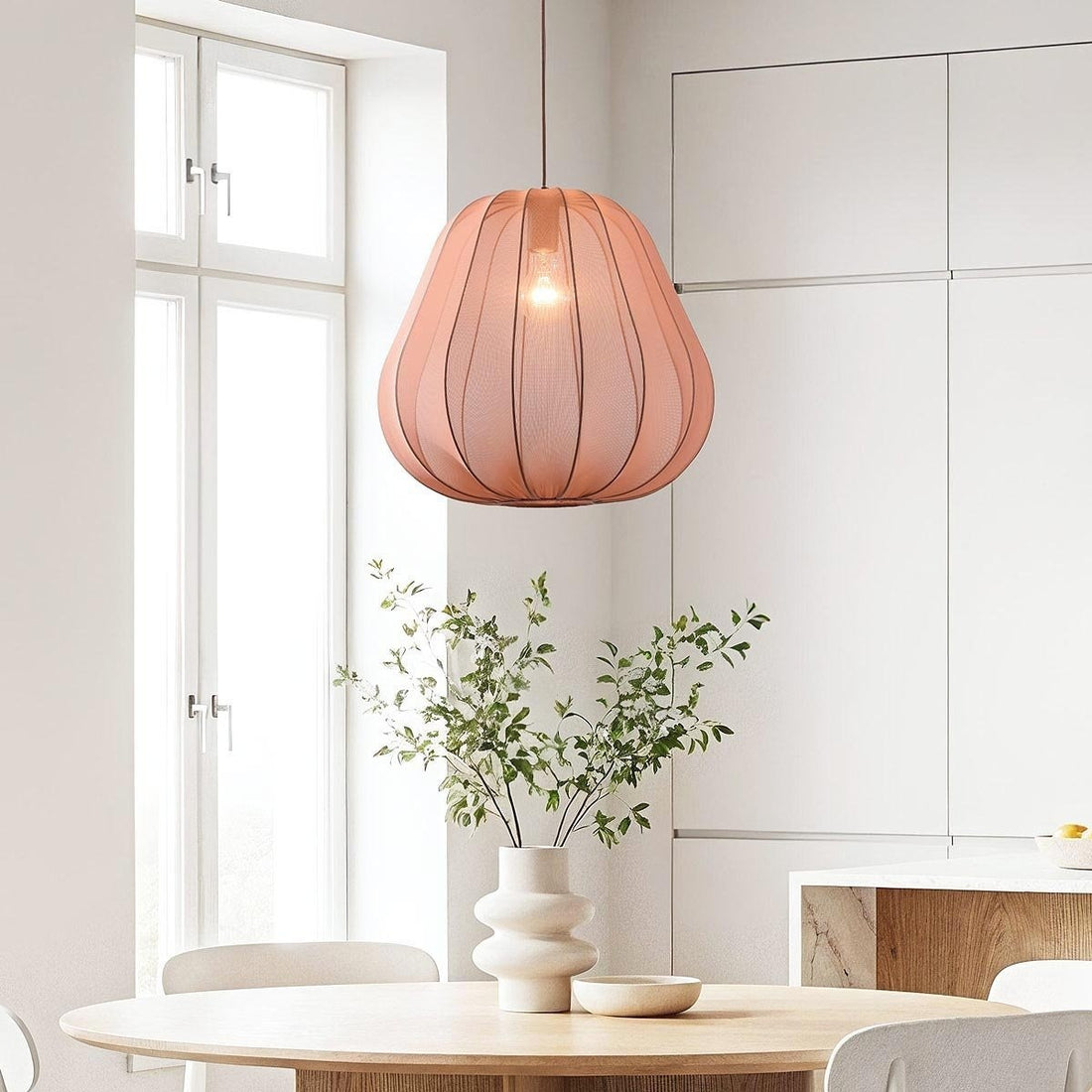Piera terracotta pink fabric pendant light 45cm diameter hanging in modern interior