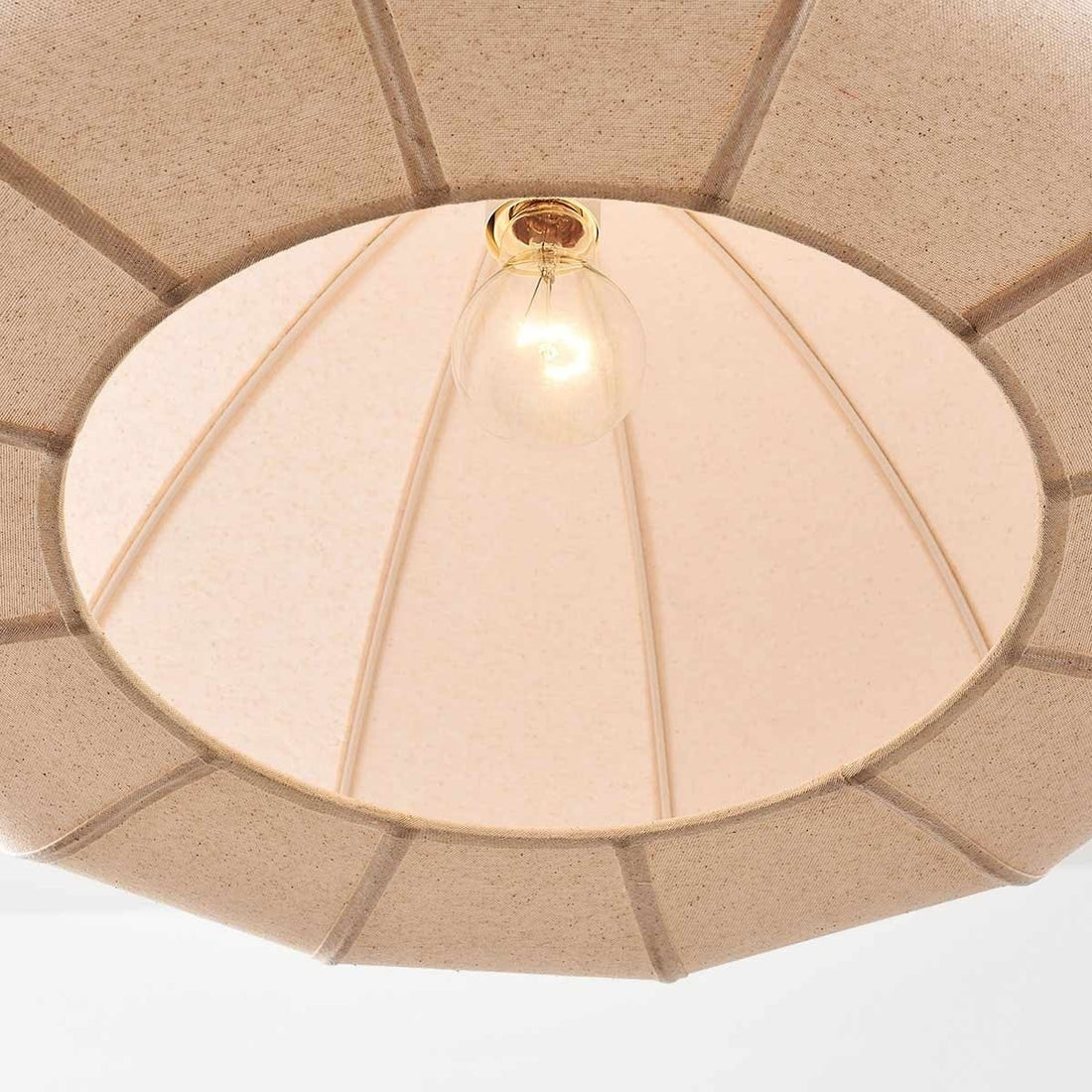 Ines 60cm off-white pendant light suspended over dining table