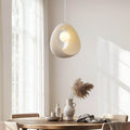 Akari sand beige stone-effect pendant light hanging over kitchen island