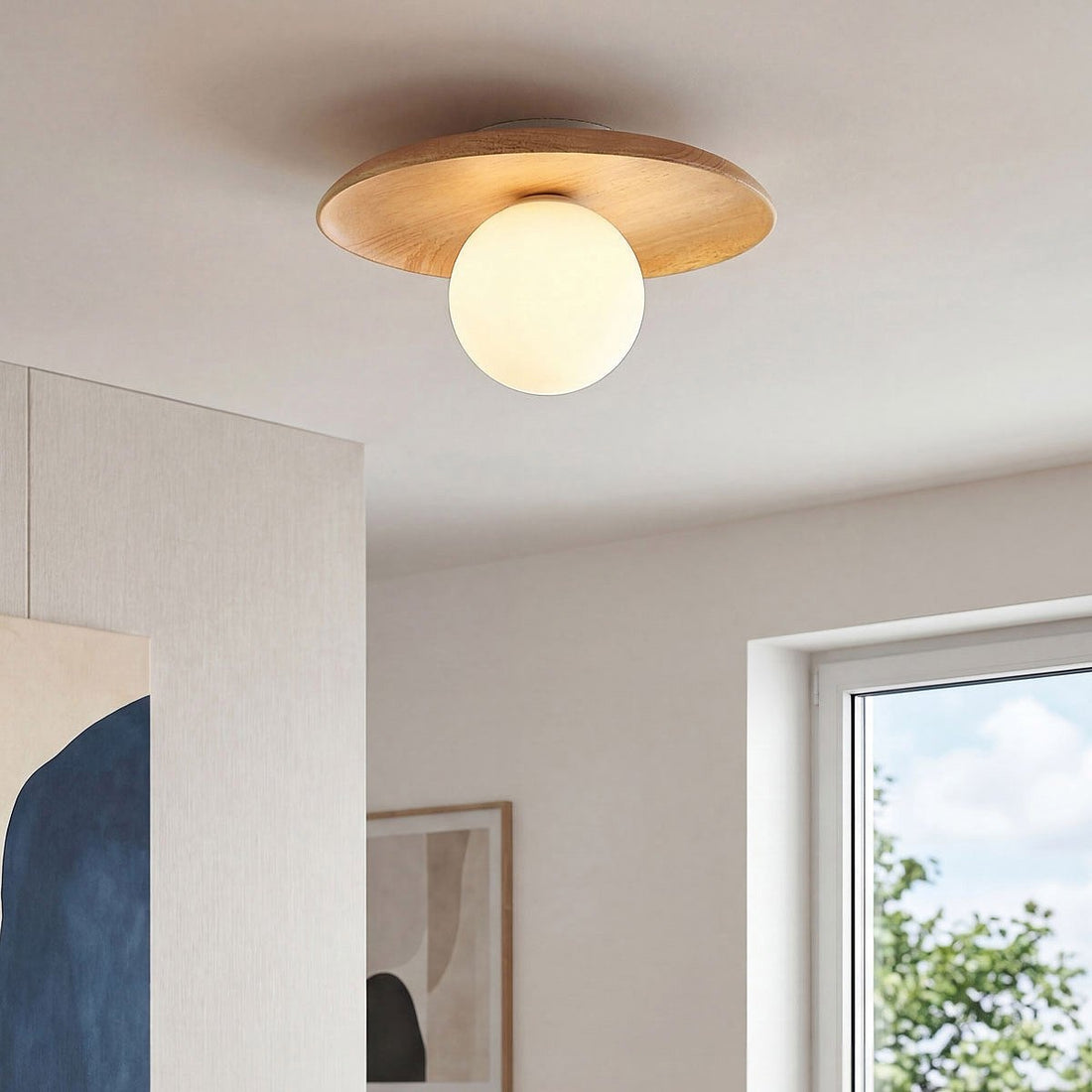 Close up of Ludo ceiling light showing wood grain and opal glass shade