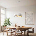Close-up of Kintsu matt white pendant light showing elongated river stone shape