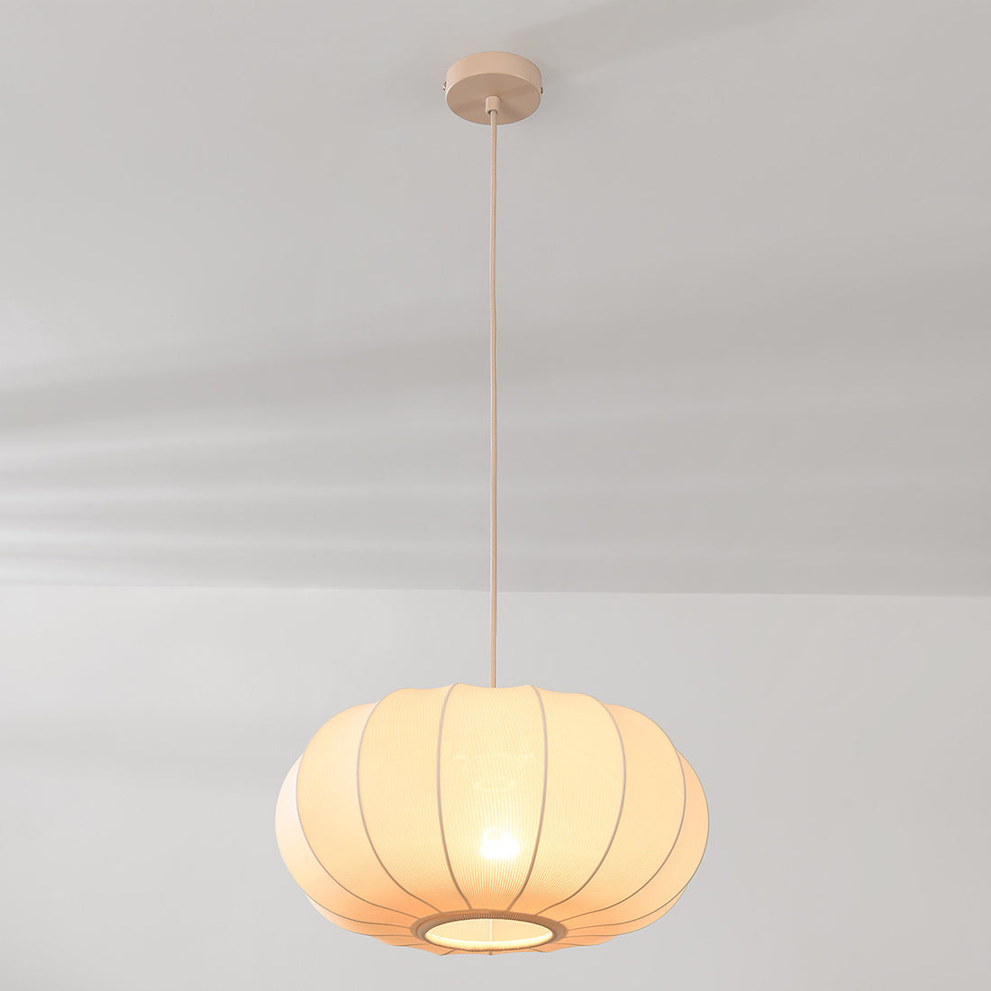 Aya drum pendant light styled in modern living room interior