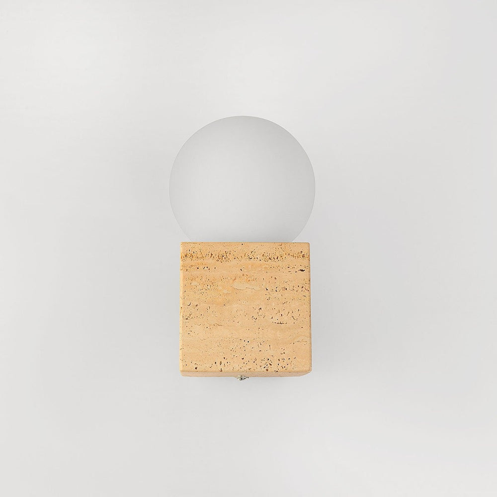 Isla Travertine Globe Wall Light — Sand Beige in a room
