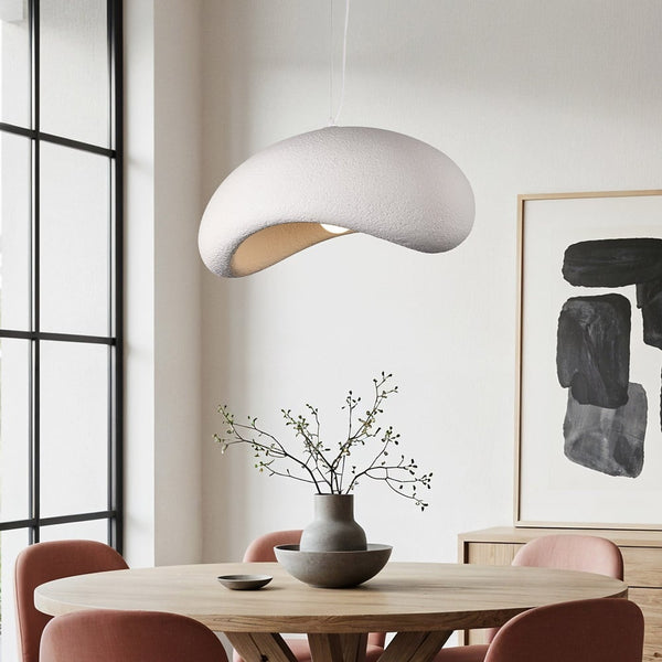 Katsura white stone-effect pendant light with layered curved planes hanging in modern interior