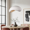 Katsura white stone-effect pendant light with layered curved planes hanging in modern interior