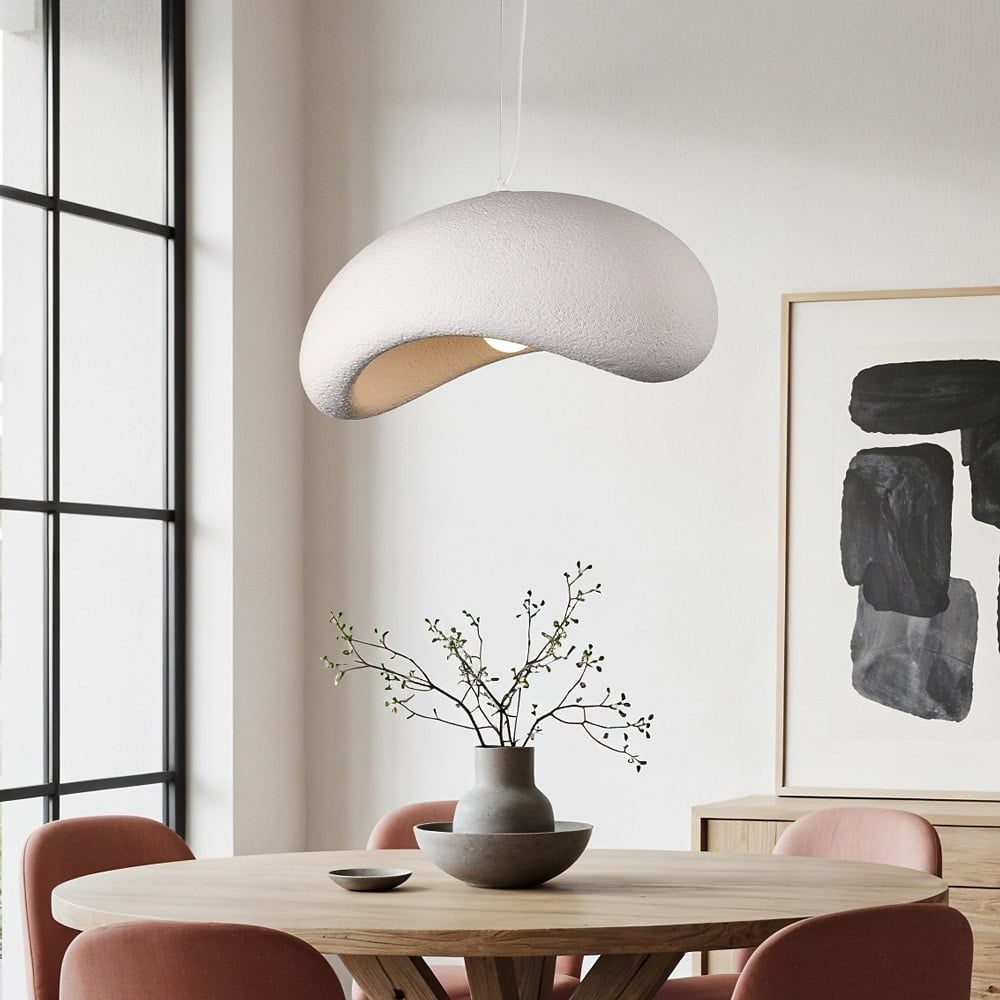 Katsura white stone-effect pendant light with layered curved planes hanging in modern interior