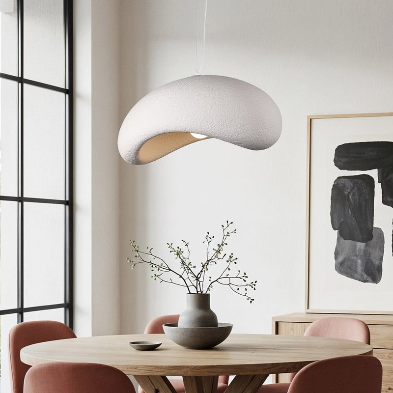 Katsura white stone-effect pendant light with layered curved planes hanging in modern interior
