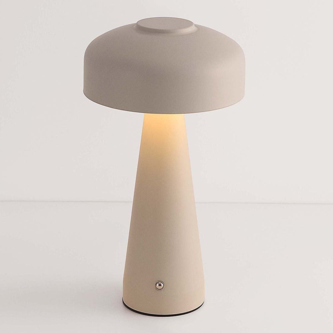 Close-up of Momo rechargeable table lamp showing organic curved design