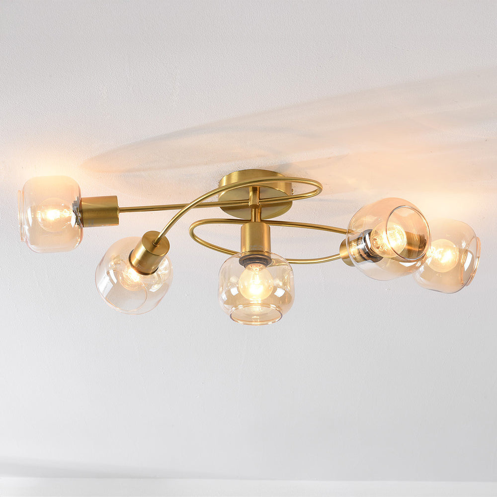 Aurum Five-Light Ceiling Light — Gold & Amber Glass in a room