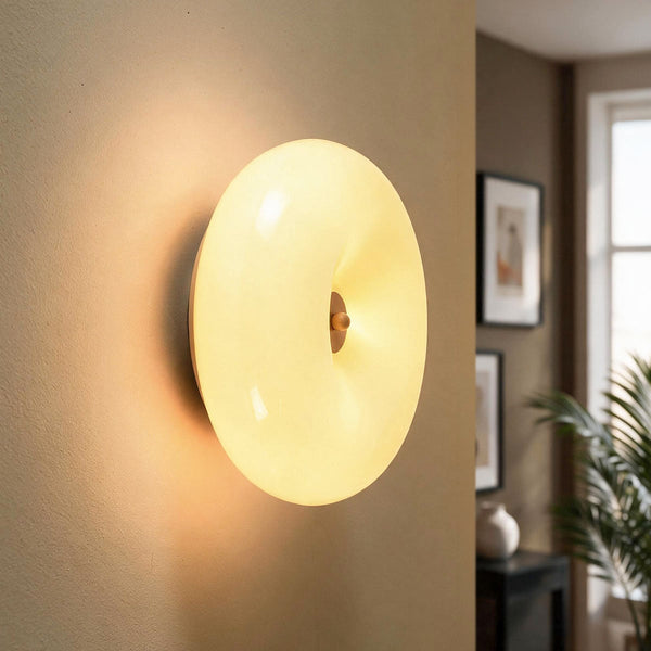 Rosa beige glass wall light with three rounded shades mounted on wall