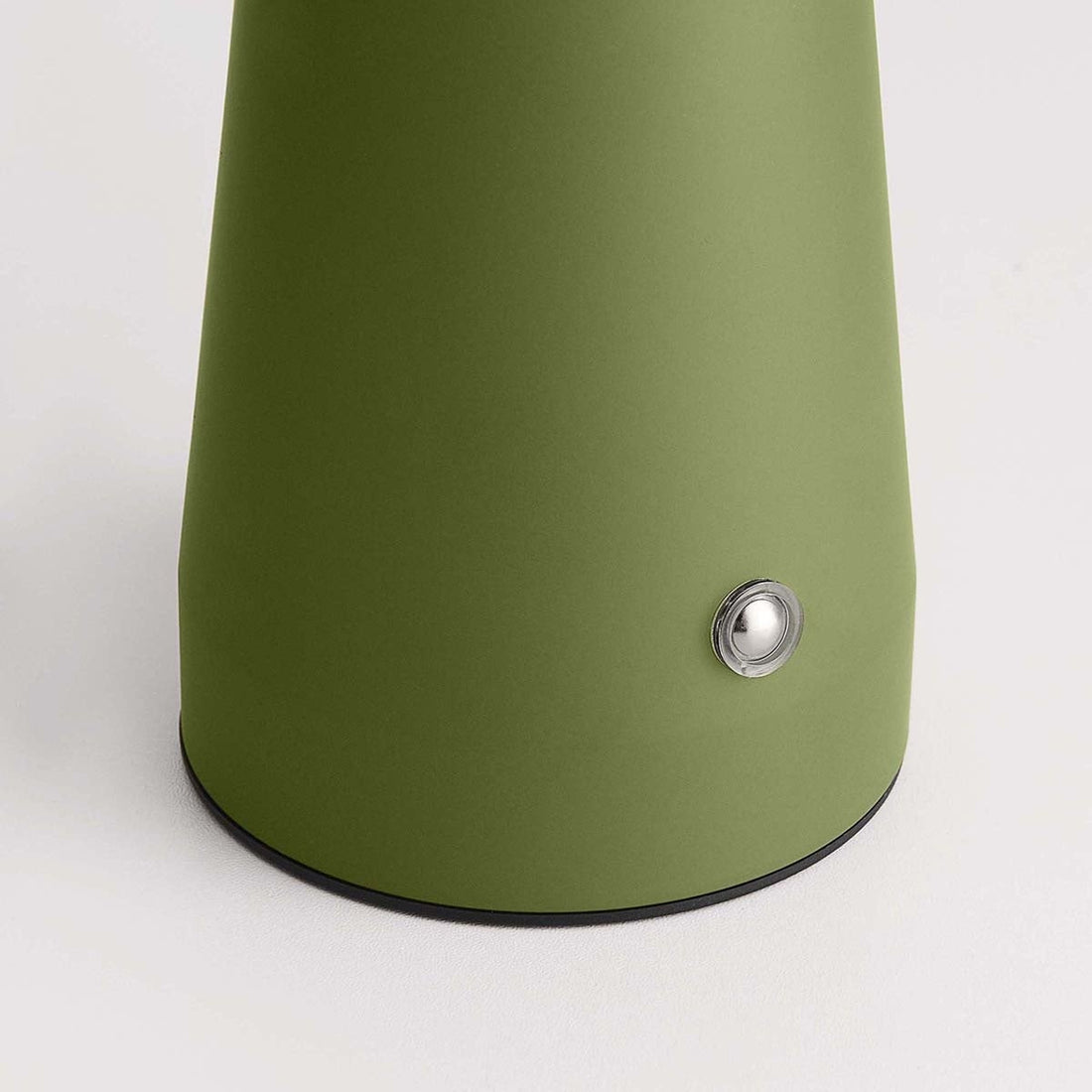 Cordless Momo table lamp in verdant green with distinctive mushroom silhouette