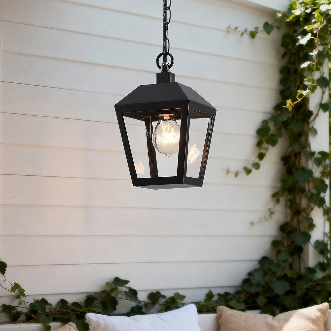 Cairn black rustic lantern pendant light hanging outdoors