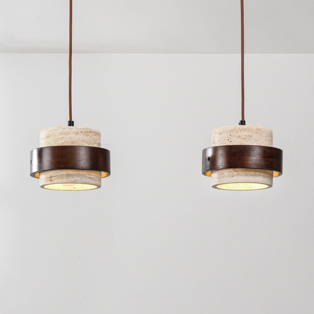 Tsumi double pendant light hanging in modern interior room setting