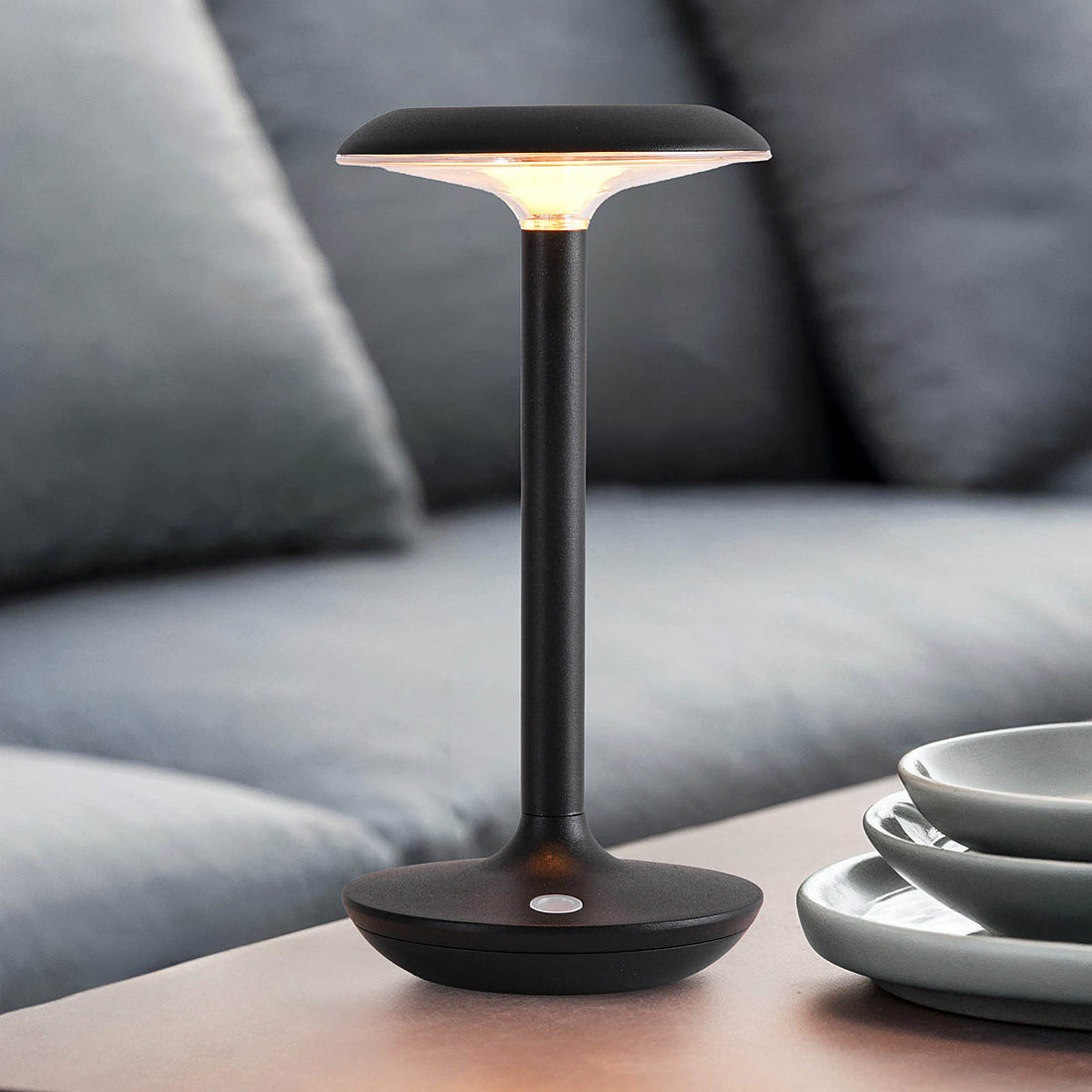Cordless rechargeable LED table lamps creating ambient lighting on dining table