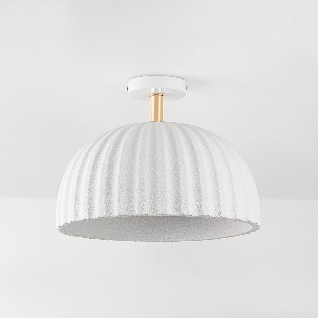 Riba modern white ceiling light installed in contemporary room setting
