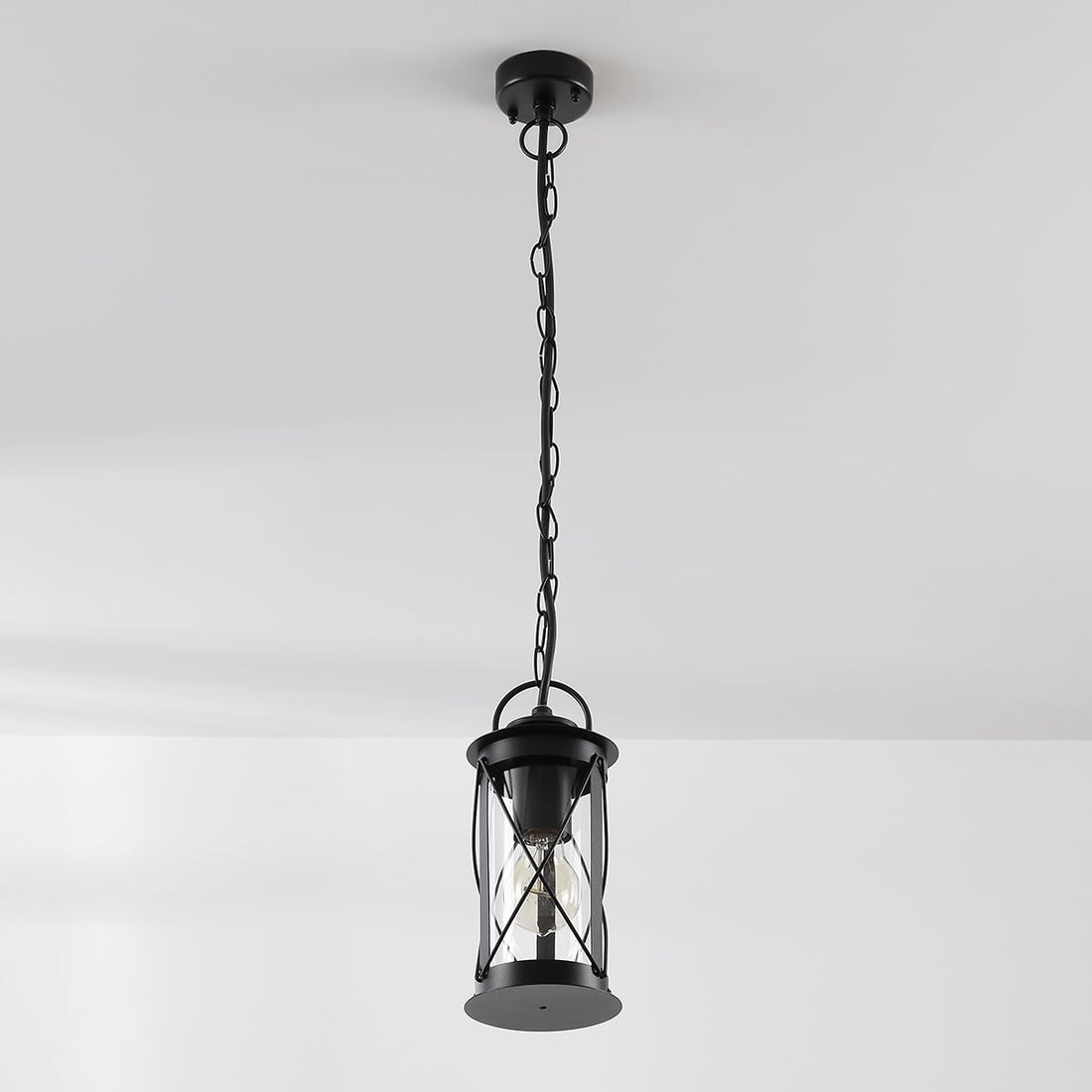 Malmo lantern outdoor pendant light in black on its link chain