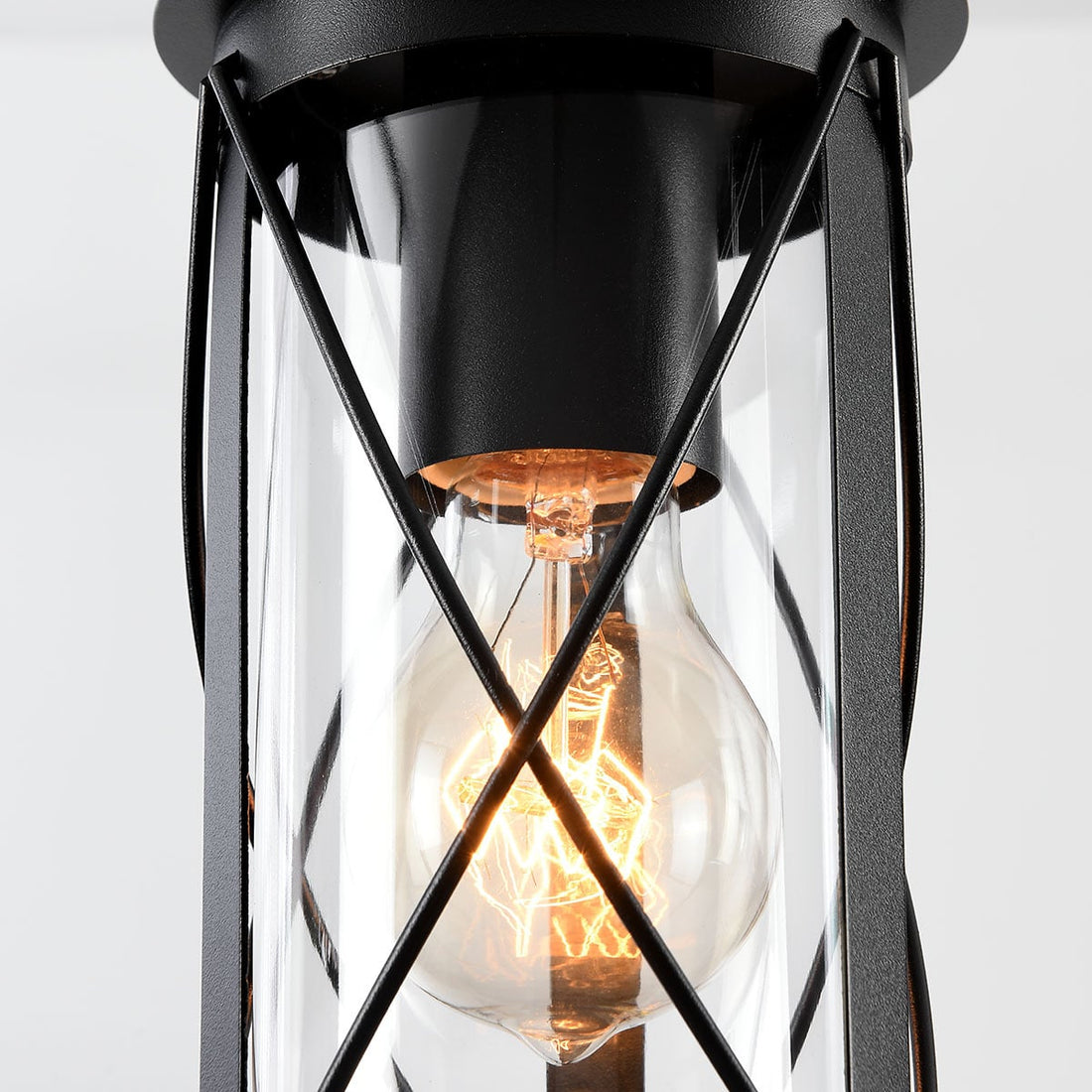 Bulb glowing inside the Malmo outdoor lantern