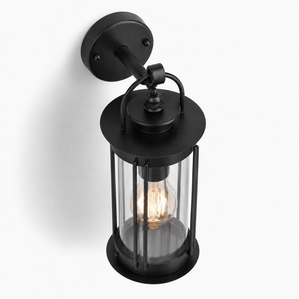 Alicia black industrial outdoor wall lantern, close-up angled view of the glass cage
