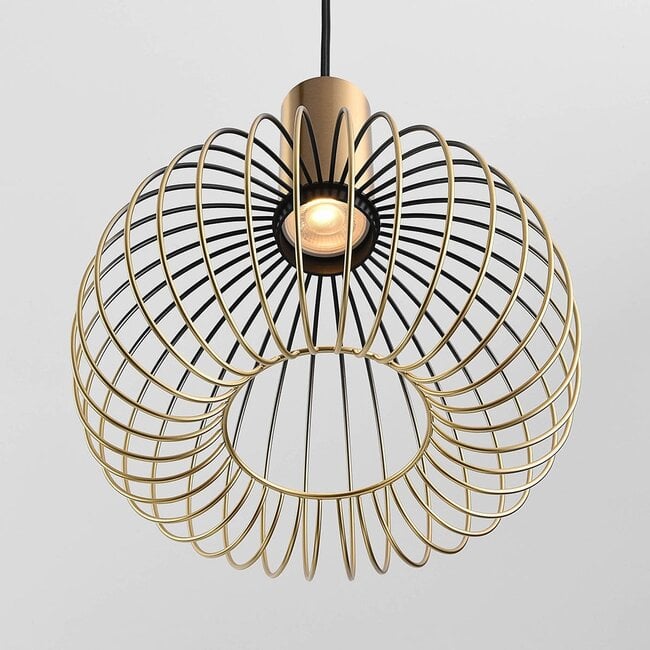 Velia black metal cage pendant light with three bulbs illuminated in living room
