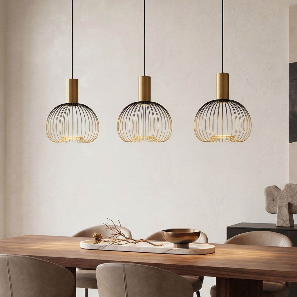 Velia 3-light black and gold cage pendant light hanging from ceiling