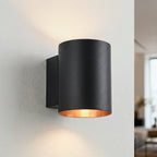 Jen modern round wall light in black with gold inner finish