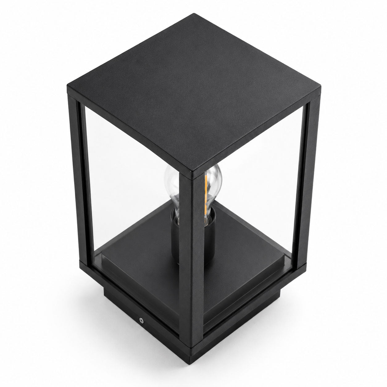 Sem glass panel post lantern in black, angled view of the cube frame and filament bulb