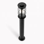 Lucia 60cm black rustic bollard post light, angled view on white